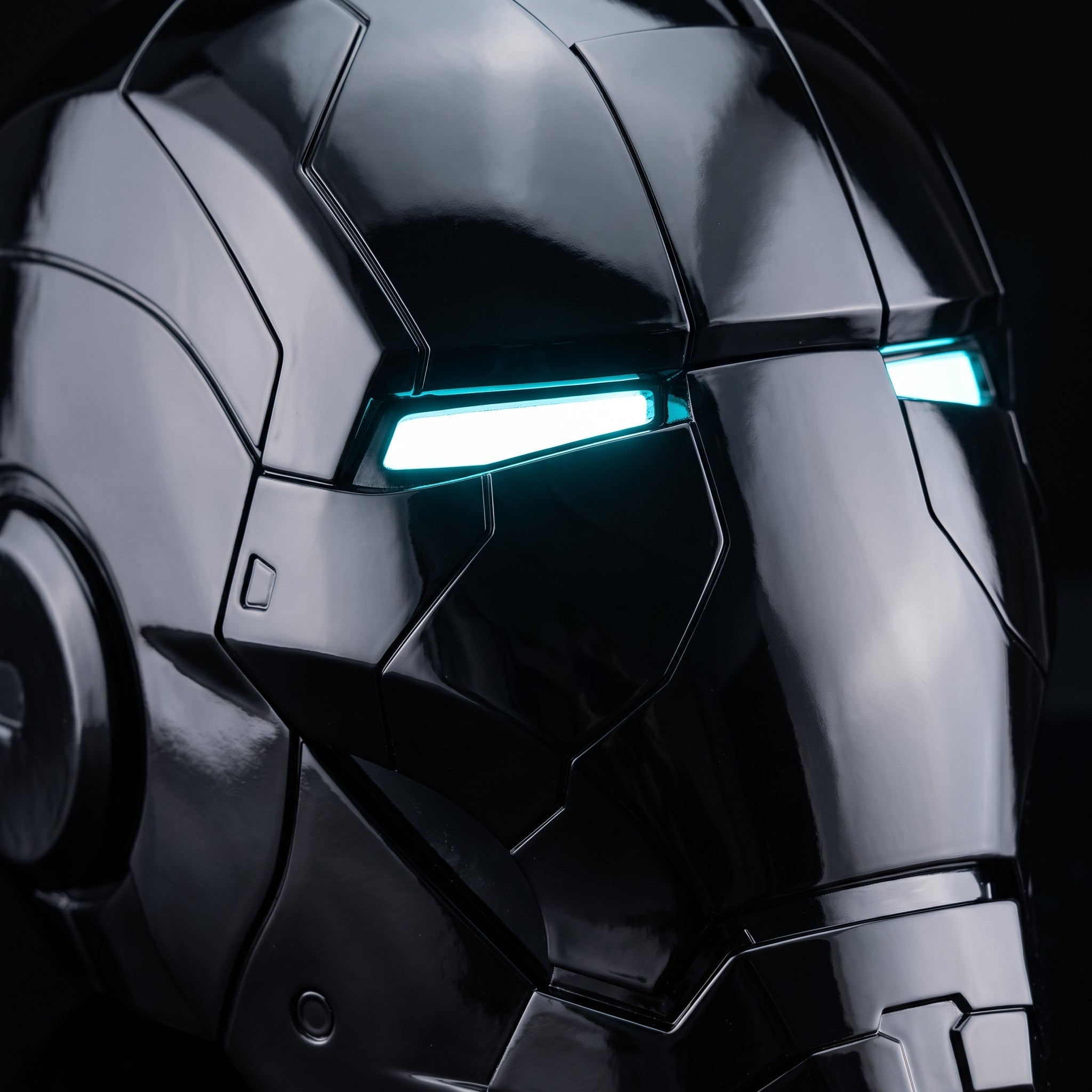 Close-up of the gloss black Mark V helmet showing panel seams and illuminated LED eye slits