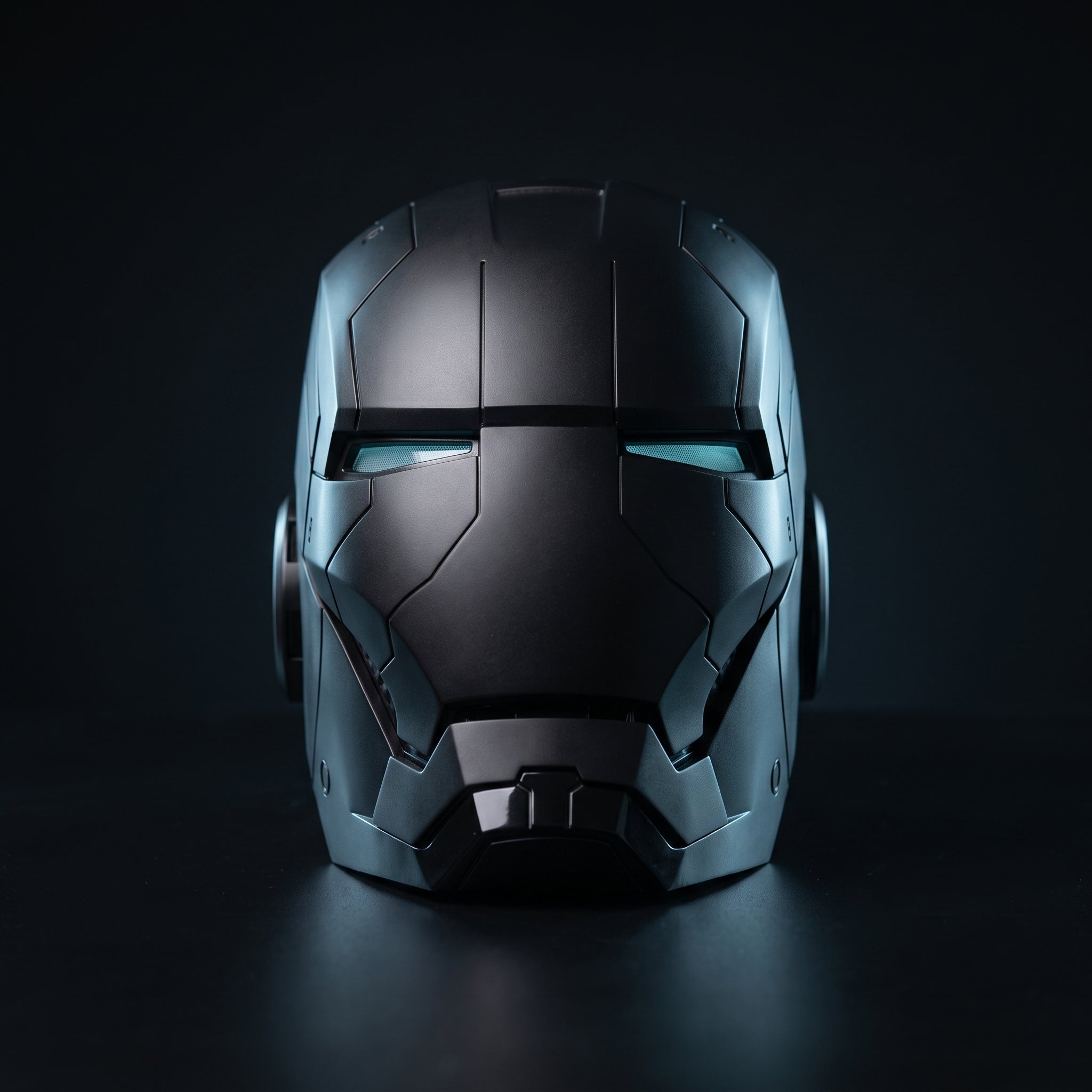 Mark V Iron Man helmet in matte black, front view with LED eyes lit, 1:1 wearable by ArcForge