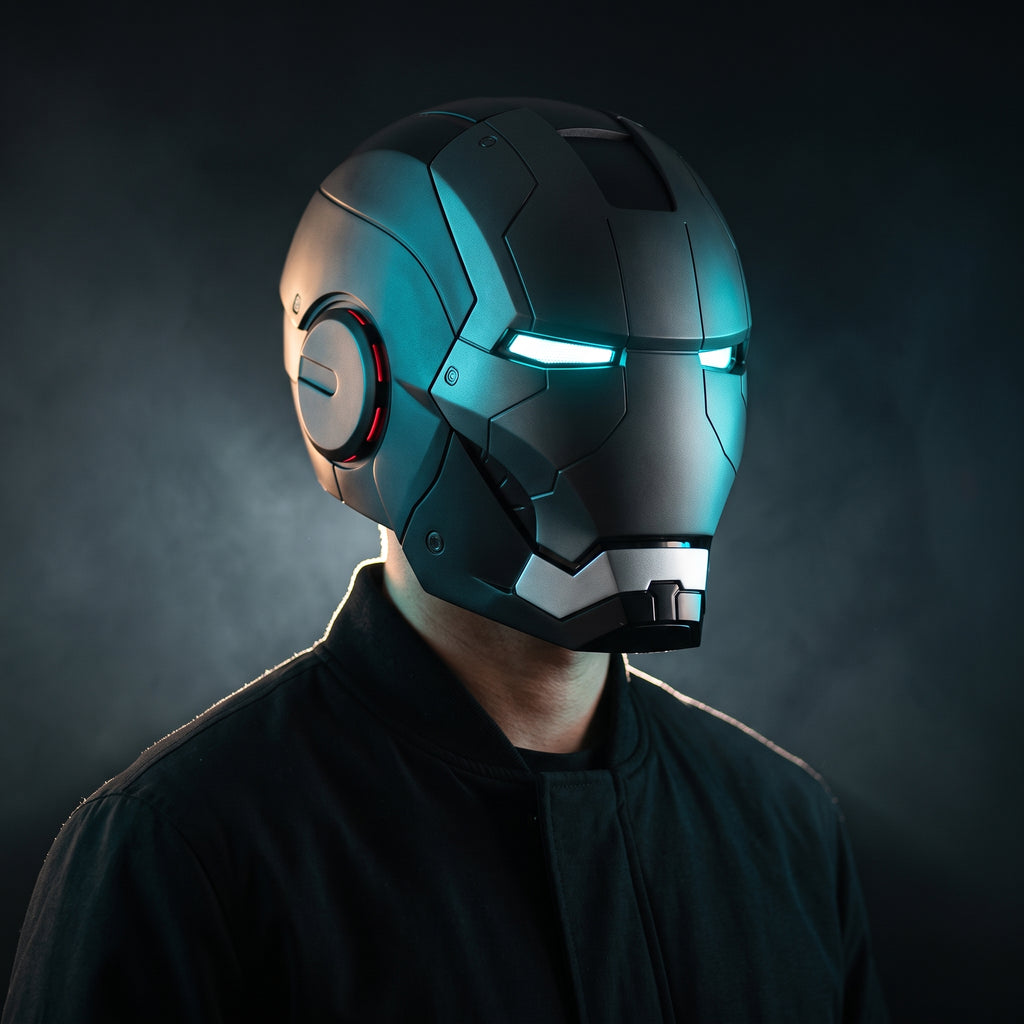 Adult wearing the matte black Mark V Iron Man helmet with the LED eyes lit