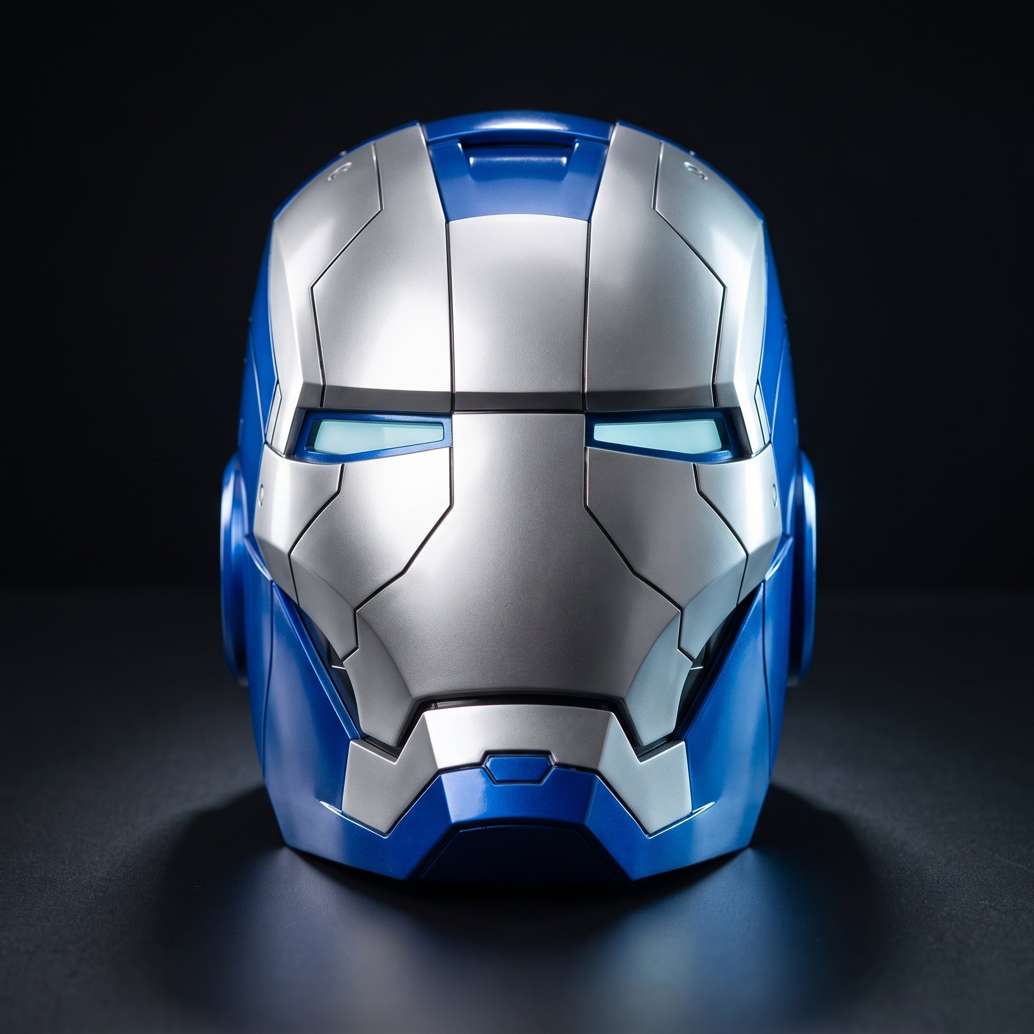 Mark V Iron Man helmet in blue and silver, front view with LED eyes lit, 1:1 wearable by ArcForge