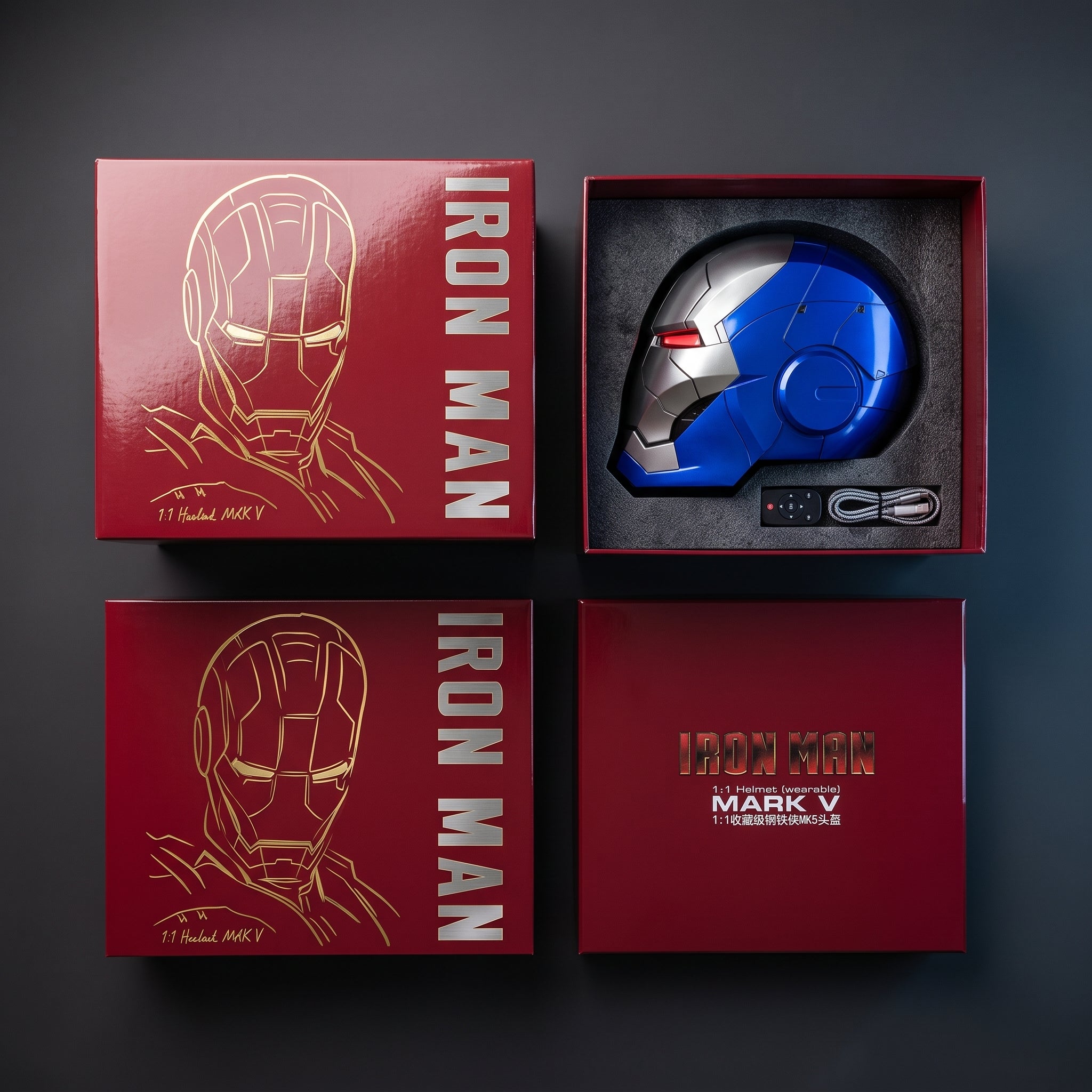 Blue and silver Mark V helmet in its open box with remote control and USB charging cable