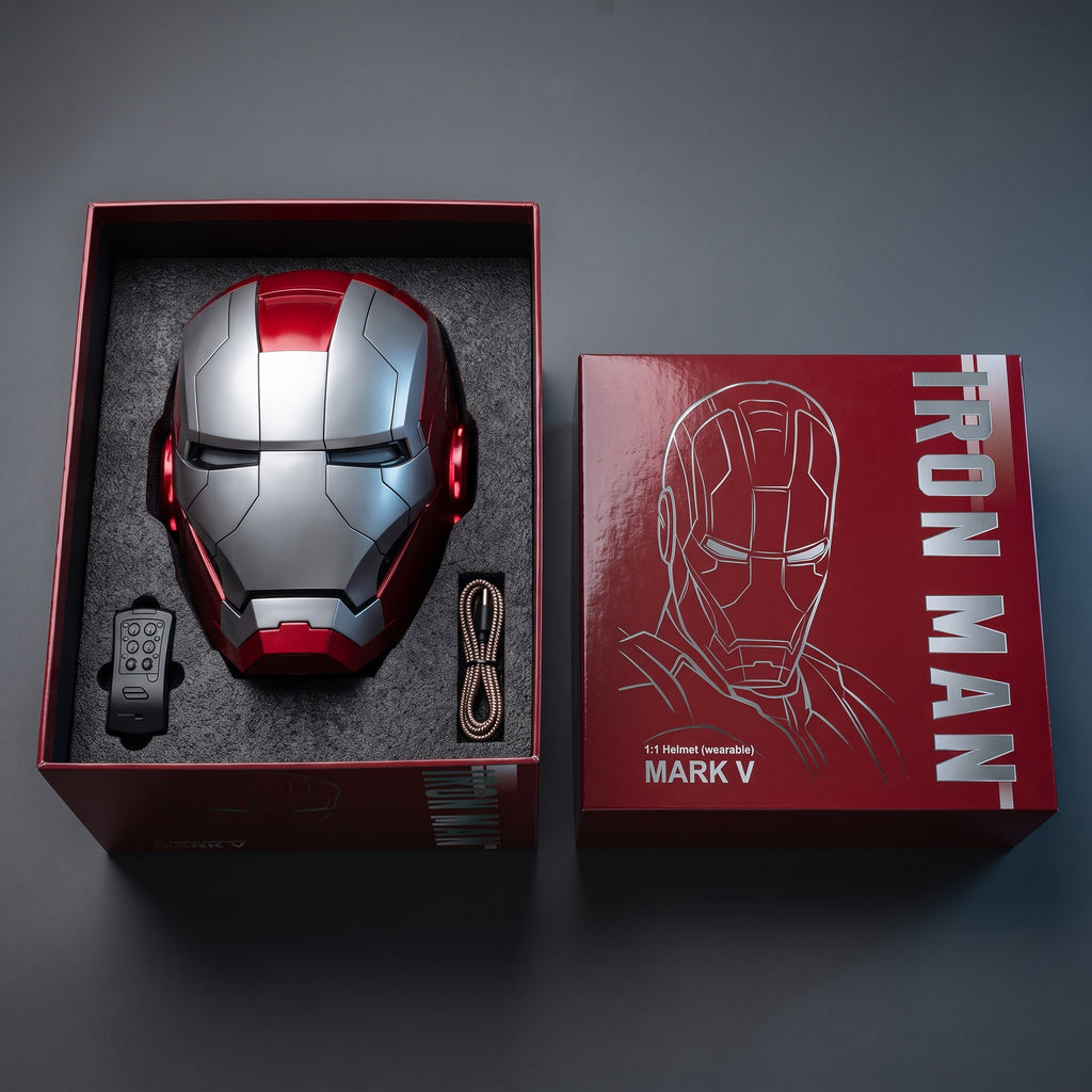 Matte silver and red Mark V helmet in its open box with remote and USB charging cable