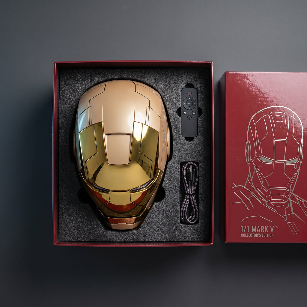 Full mirror gold Mark V helmet in its open box with remote and USB charging cable